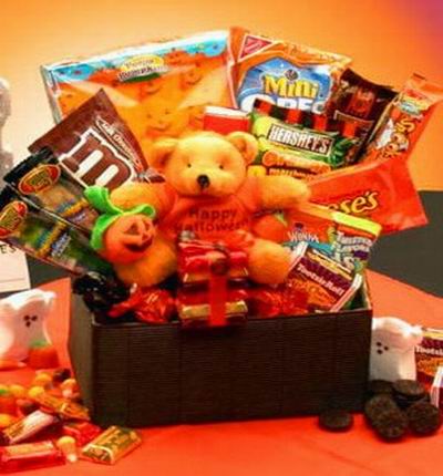 Candy in a picnic style basket. Toy may vary based on availability