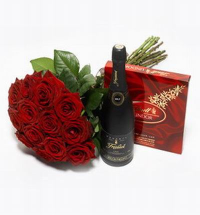 12 Roses with Lindt Chocolates and a bottle of champagne.  The box of chocolates may vary based on availability.