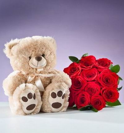 12 roses with a 30cm teddy bear. Teddy bears may vary based on availability.